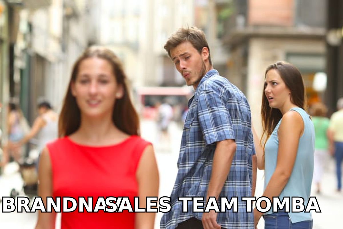 Distracted-boyfriend meme: a sales team eyeing Tomba while walking past Brandnav