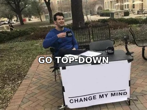 Change my mind meme reading go top-down, table and chair on campus lawn